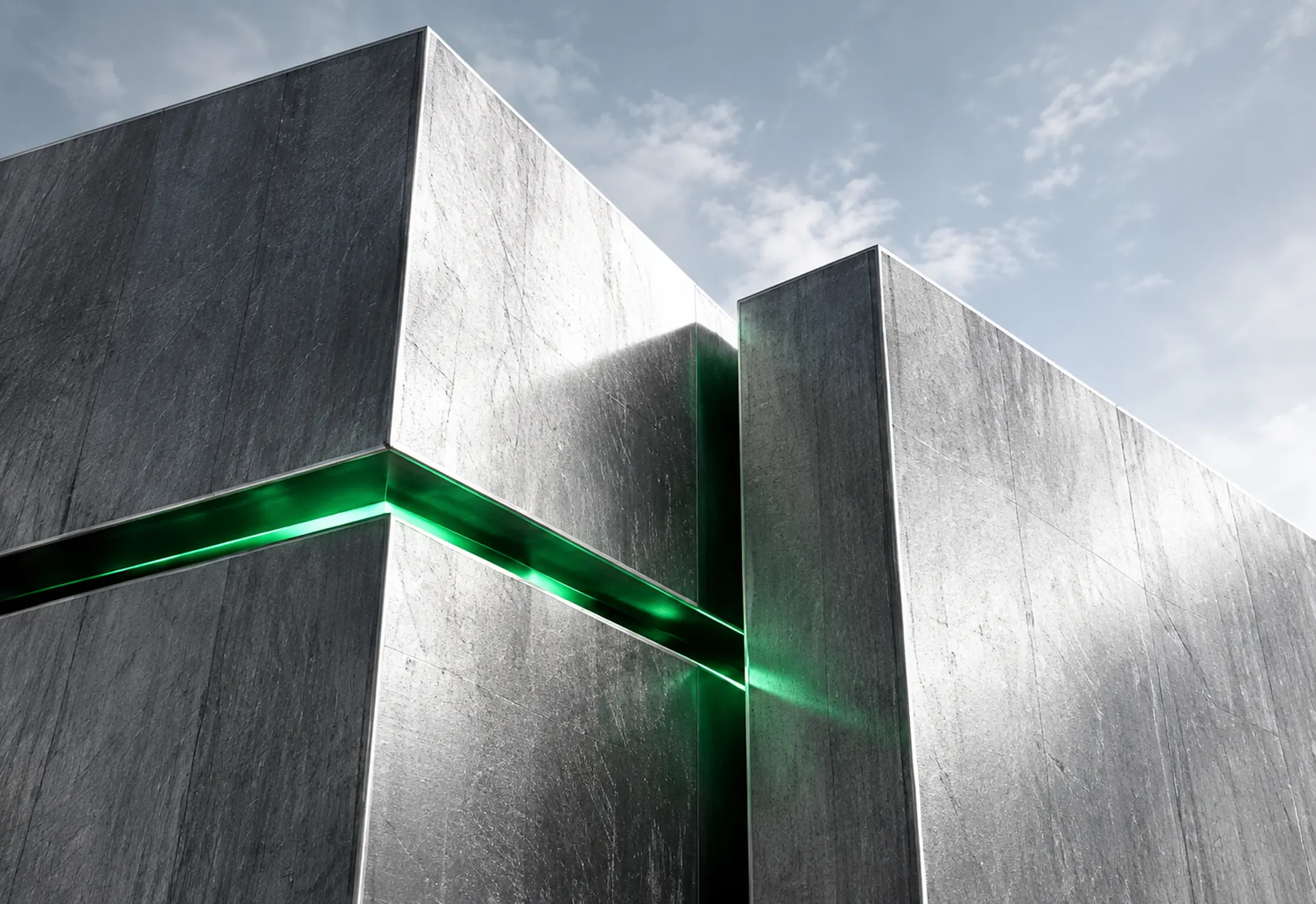 Monumental silver forms with a narrow emerald seam